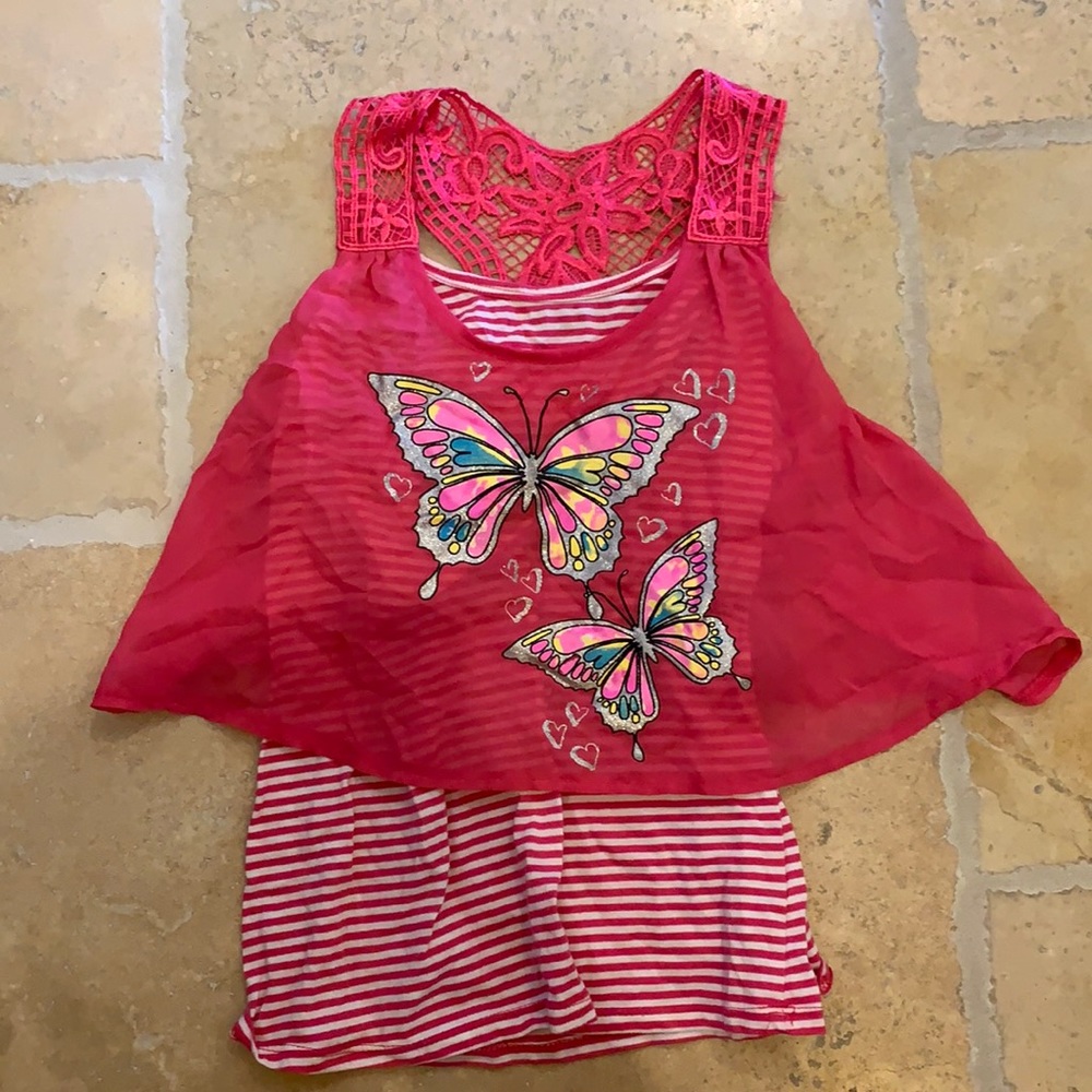A cute tank top in the brand tempted girls